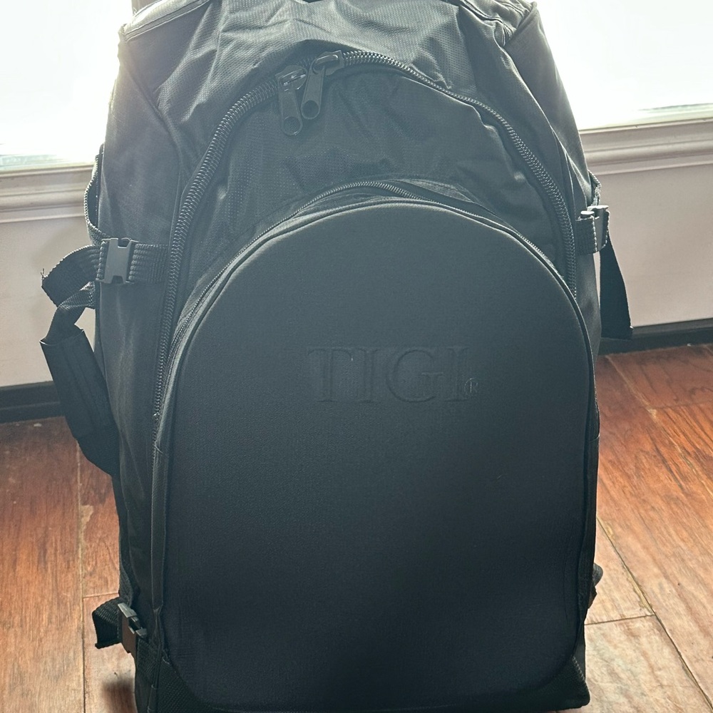 TIGI black carry-on luggage with wheels new 22x12x12